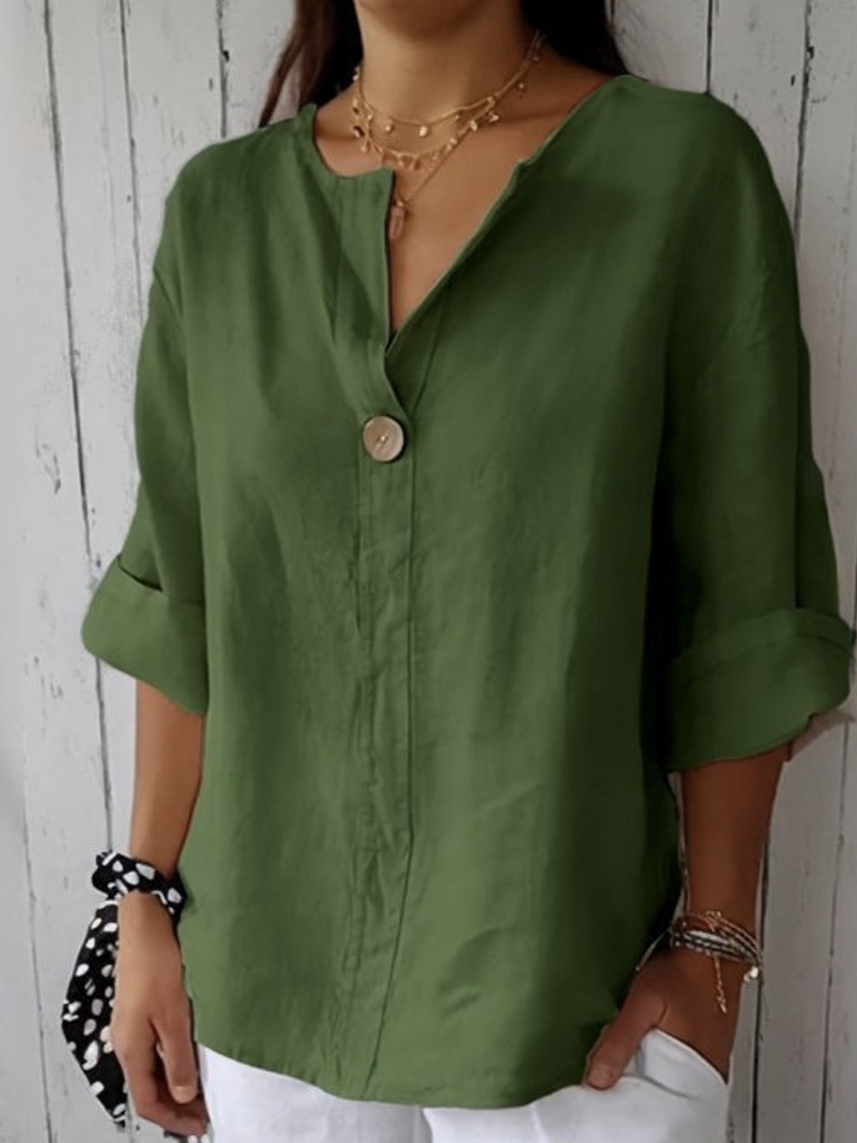 AVA | Blusa holgada con Cuello en V