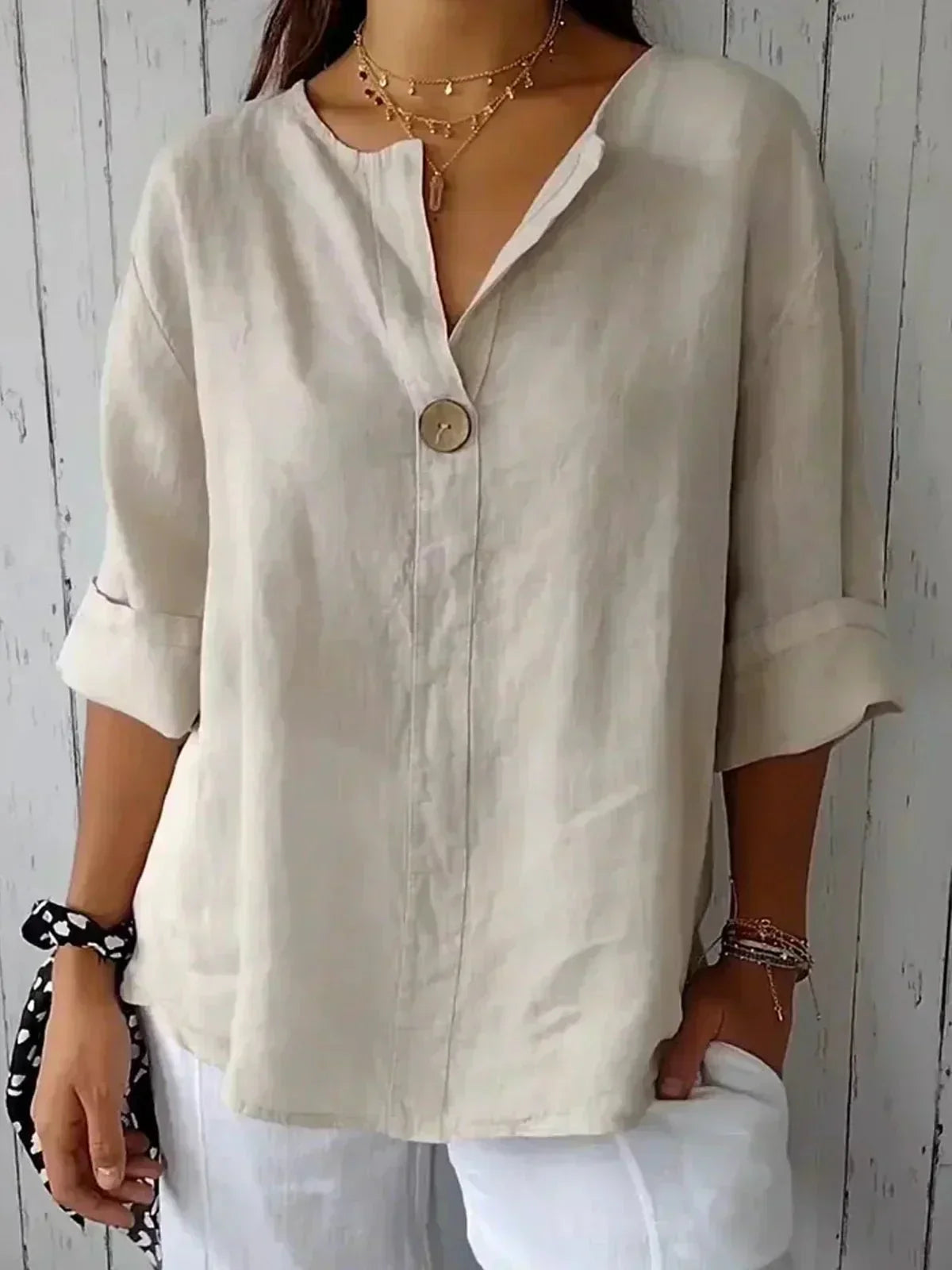 AVA | Blusa holgada con Cuello en V